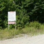Mile 38 Road caution sign