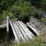 Old ATV bridge crossing pond drainage