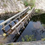 The submerged bridge across the creek feeding Lumsden Lake